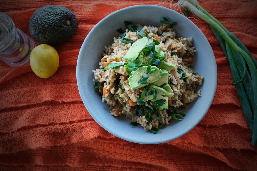 a bowl of rice and vegetables on a table