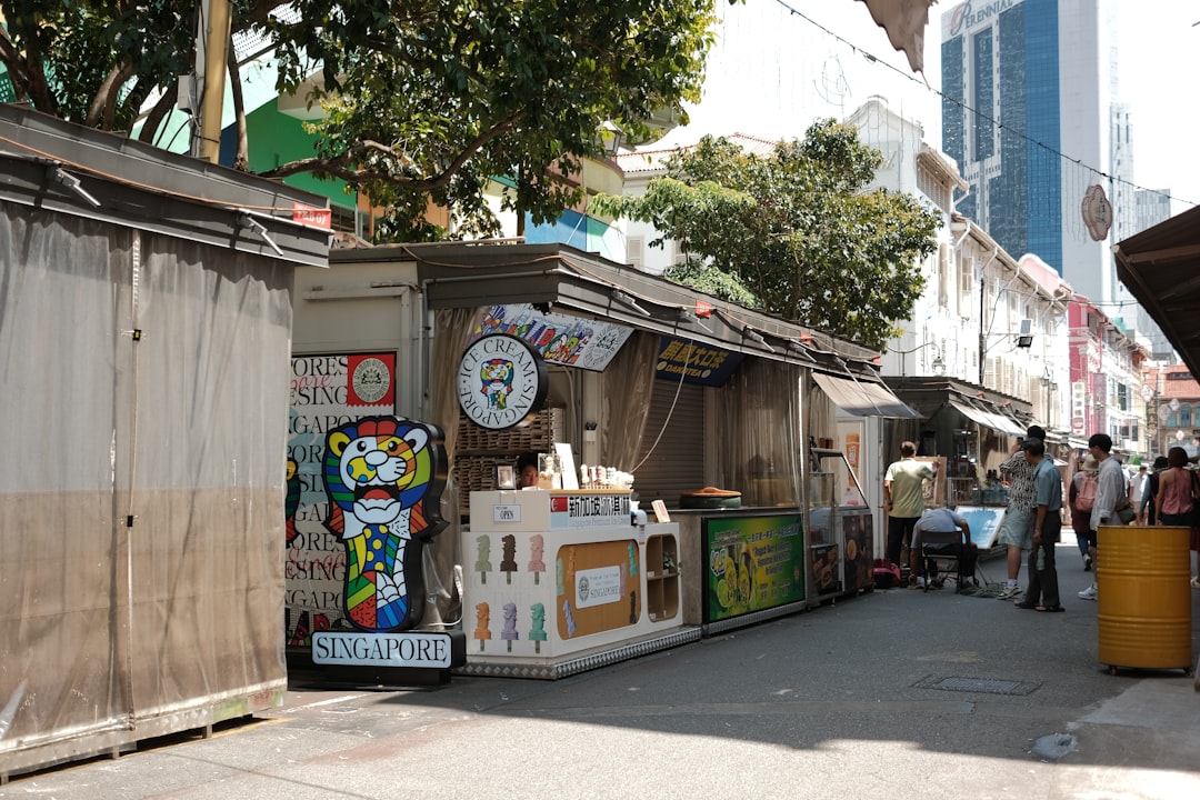 Street stalls lined up in an outdoor market.