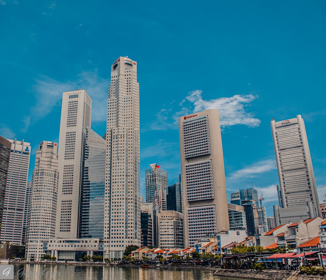 city buildings under blue sky during daytime