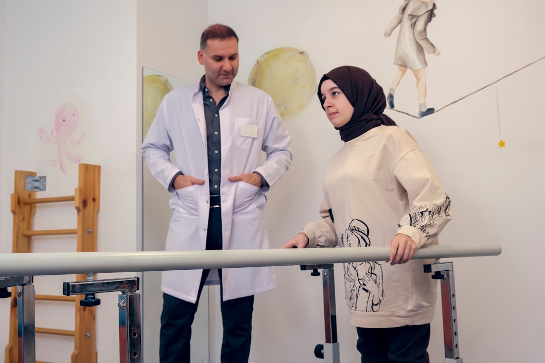 a man and a woman standing next to each other