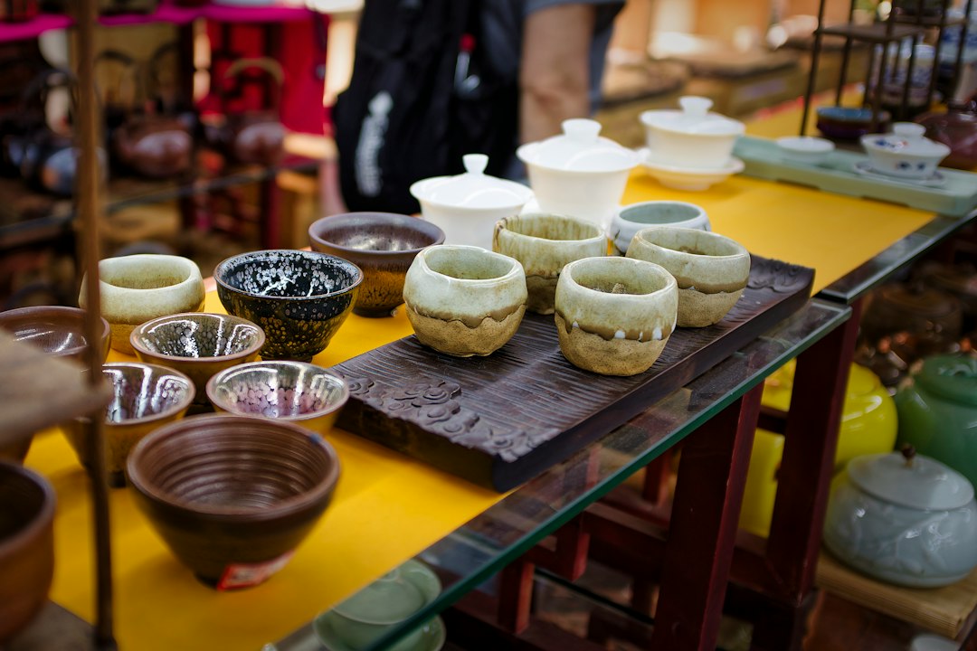 A table topped with lots of bowls and bowls