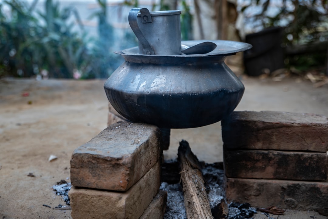 cooking pot on bricks