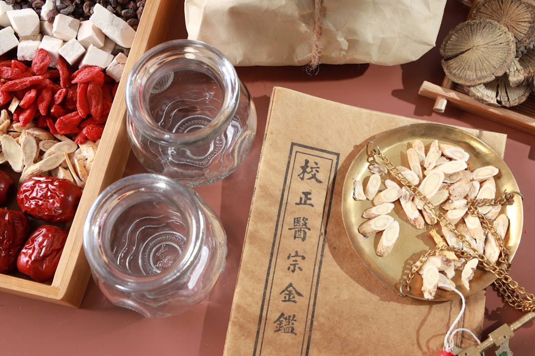 clear glass ashtray on brown wooden table