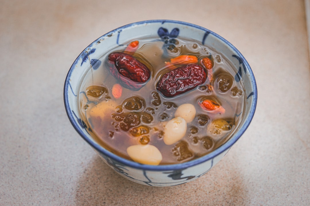 white ceramic bowl with sliced fruits
