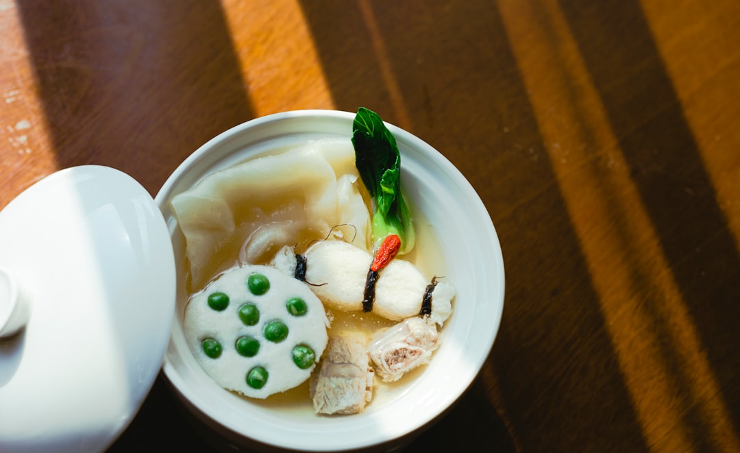 white ceramic bowl with soup