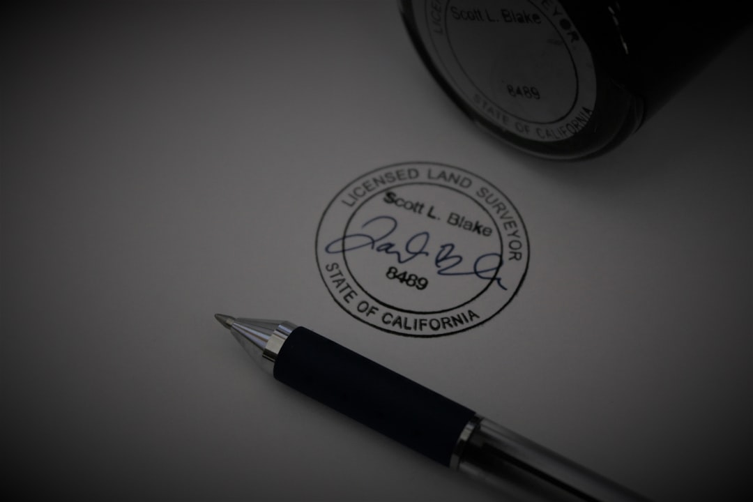 a pen sitting on top of a piece of paper