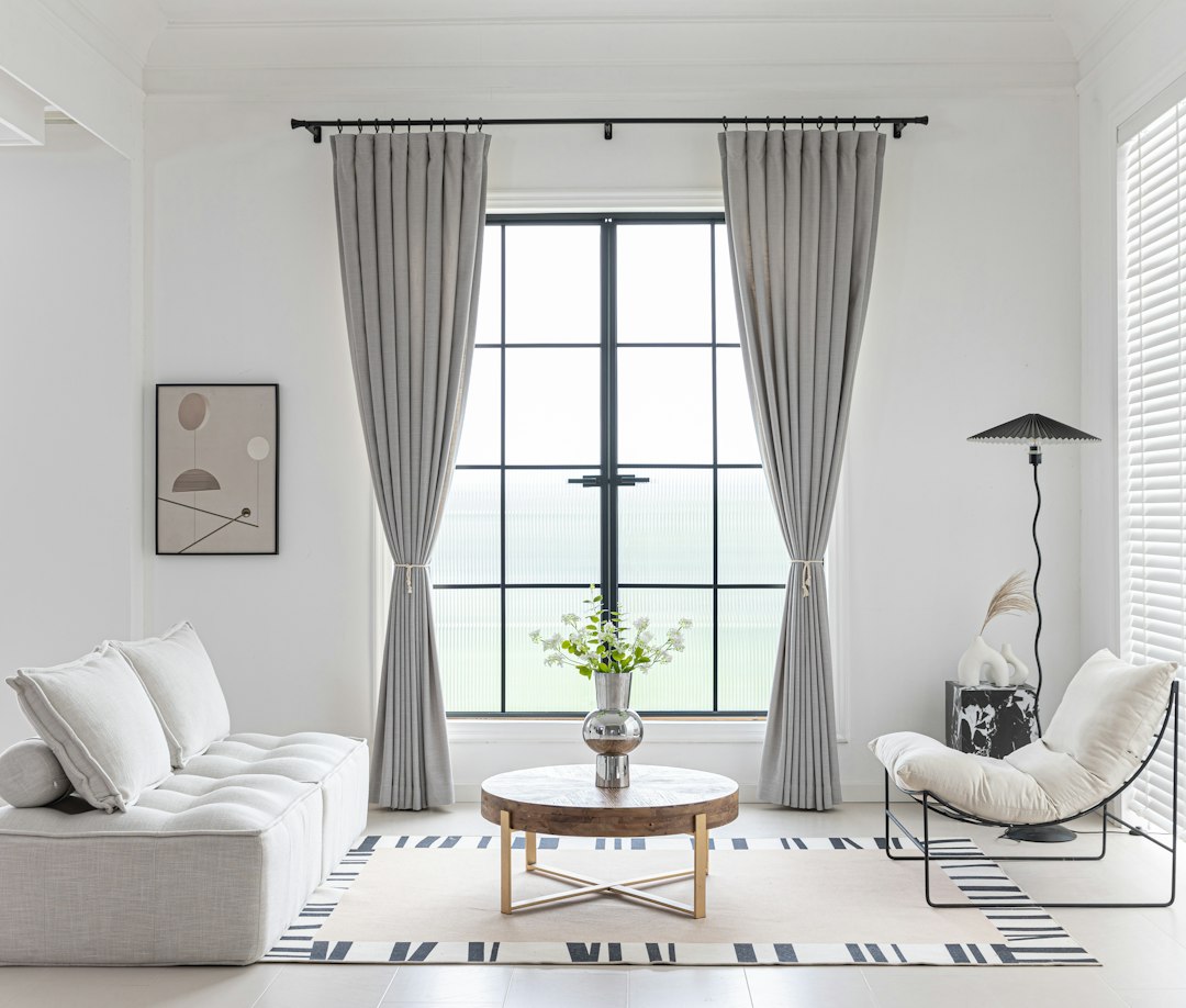 Modern living room with neutral color scheme and minimalist decor