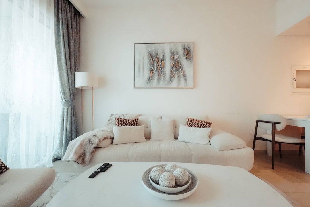 Modern living room with sofa and coffee table.