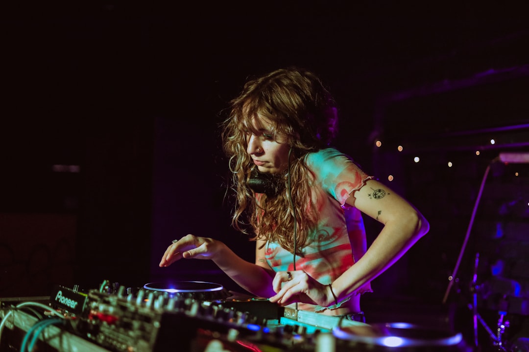 A woman djing at a music event