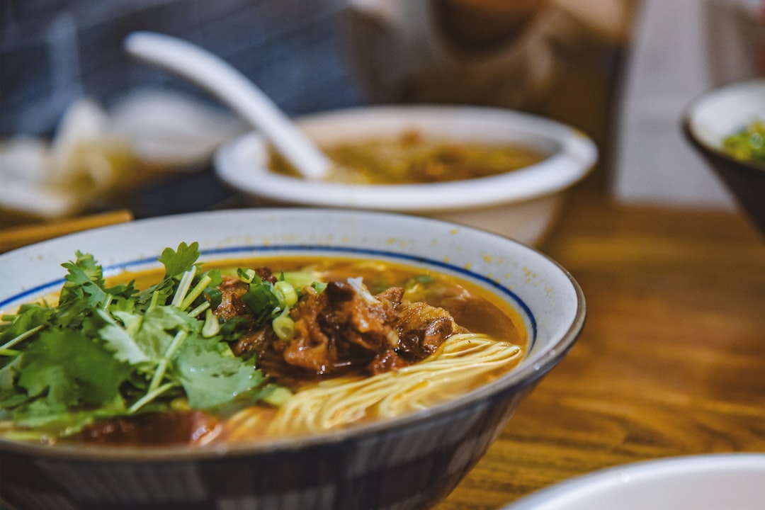 a bowl of soup with a spoon