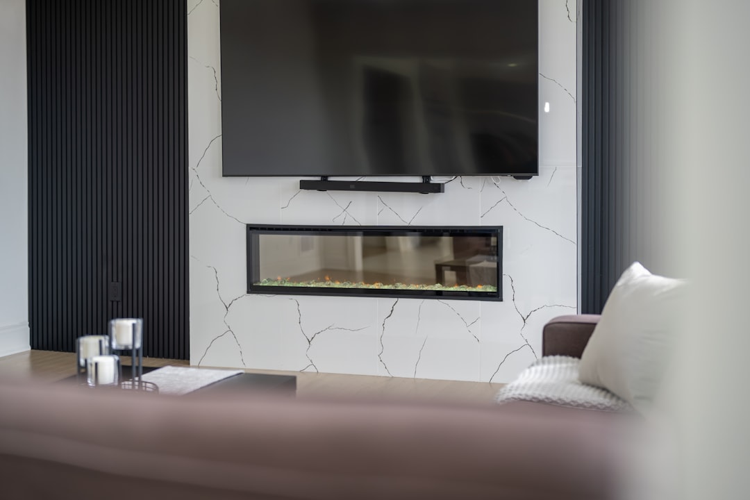 Modern living room with fireplace and television