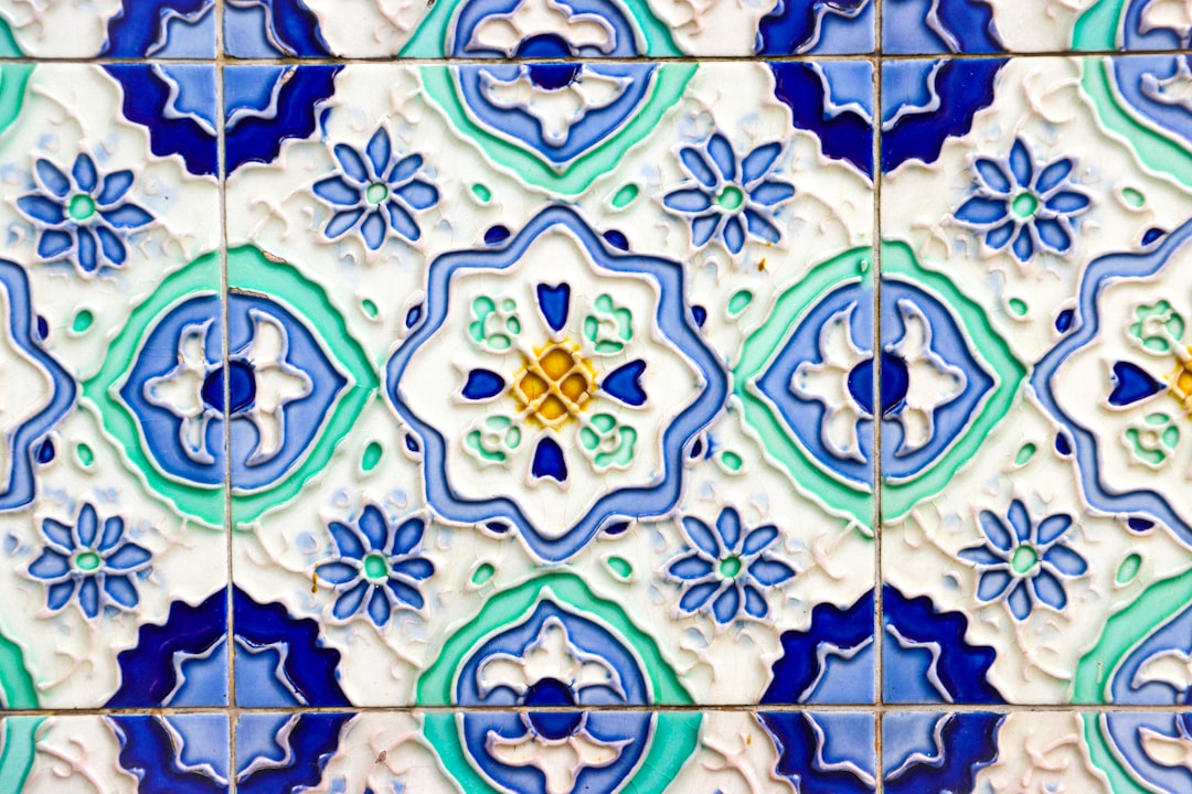 Intricate blue and green floral tile pattern