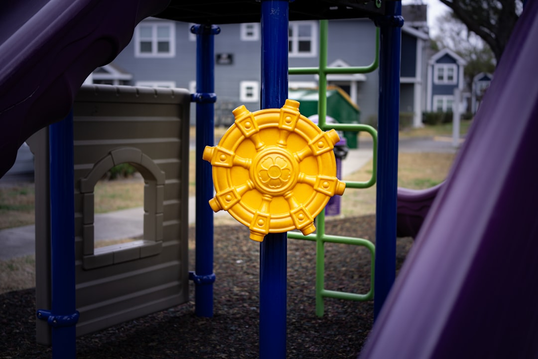 Yellow steering wheel on a playground structure