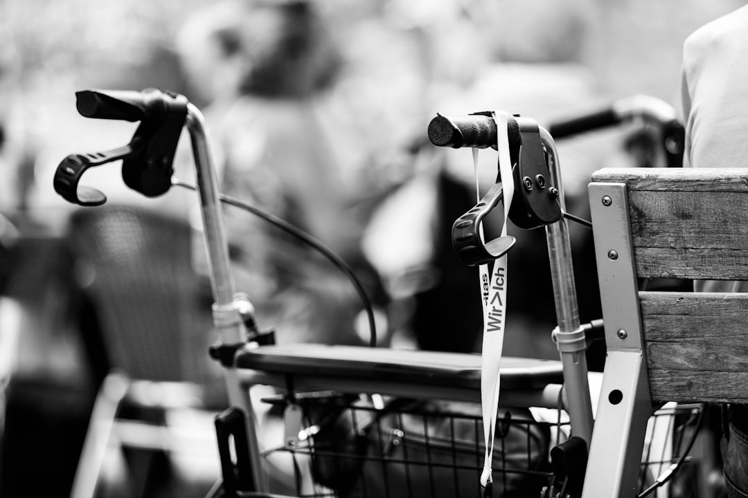 a black and white photo of a bicycle with a basket
