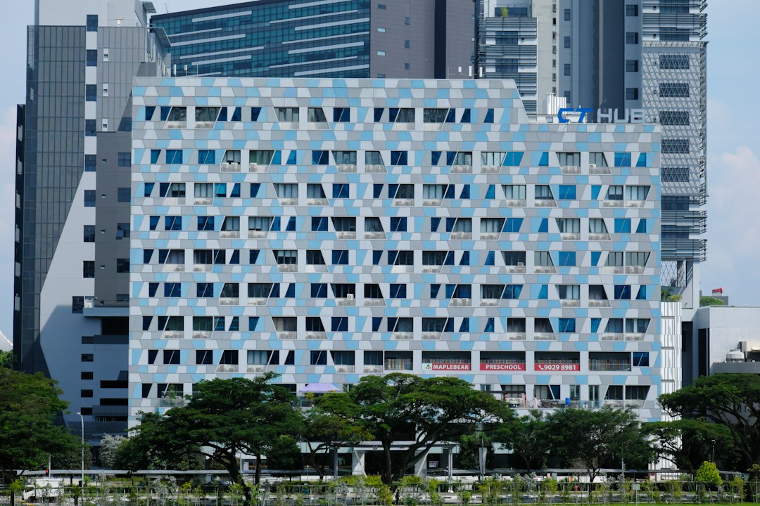 a large building with a lot of windows in front of it