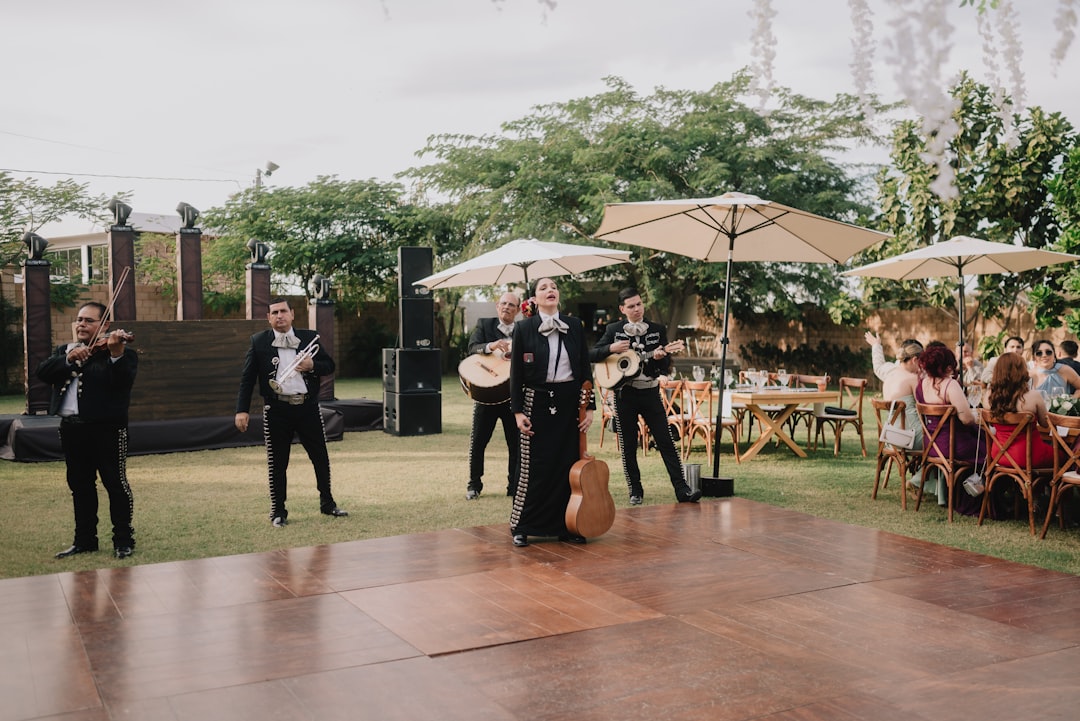 Mariachi band performing outdoors at an event