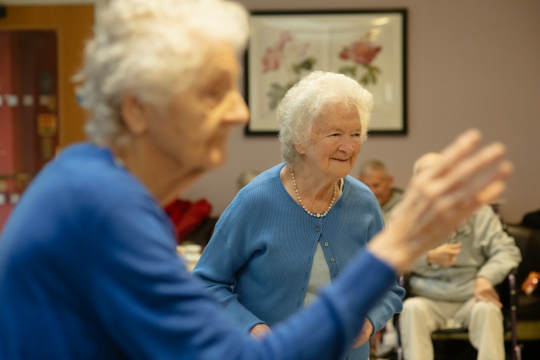 Elderly women engaged in an activity together
