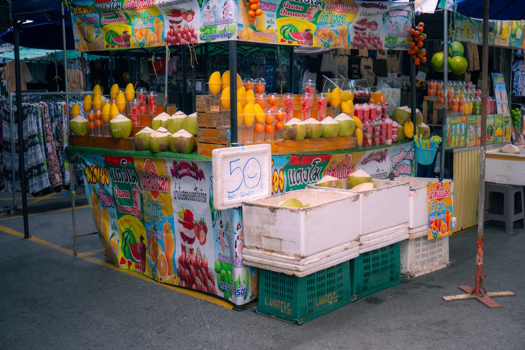 Fruit stand with coconuts and drinks
