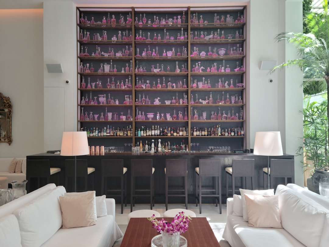 A living room filled with furniture and a bar