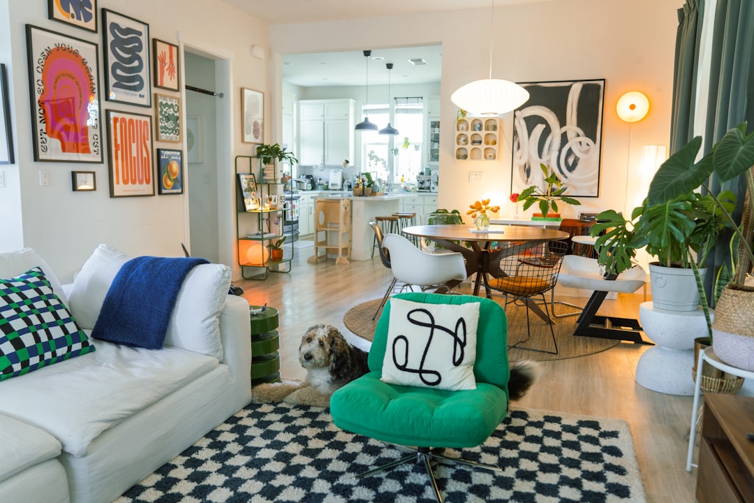 Cozy living room with eclectic art and a dog