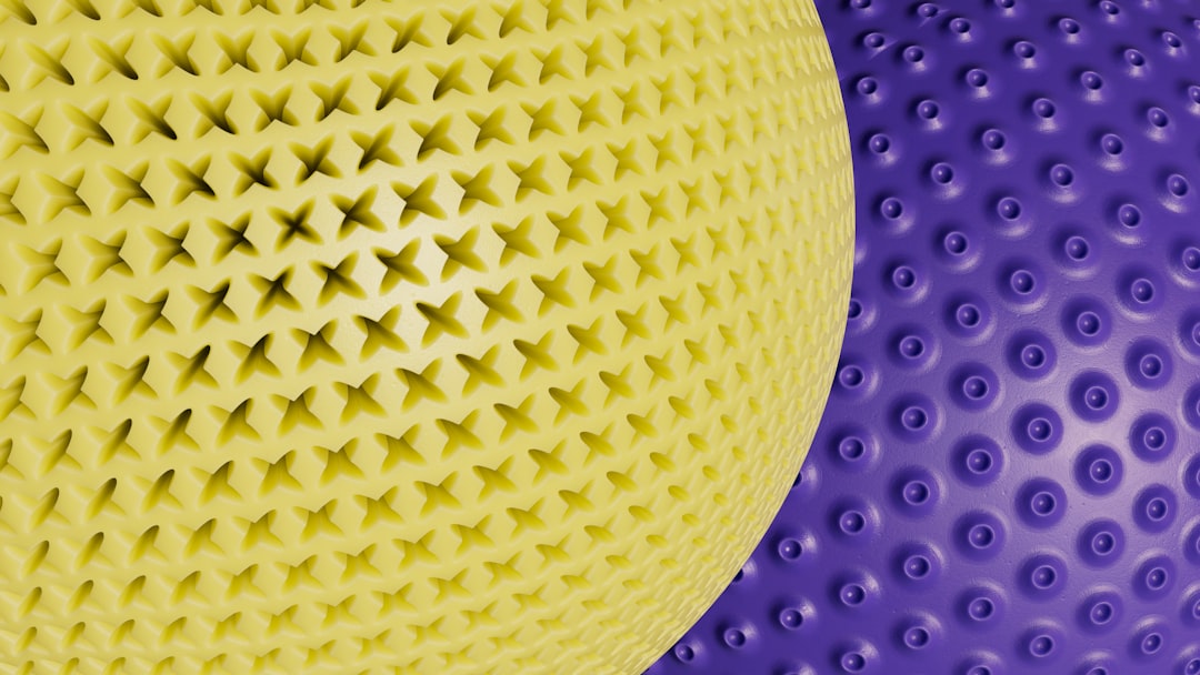 a close up of a yellow and purple object
