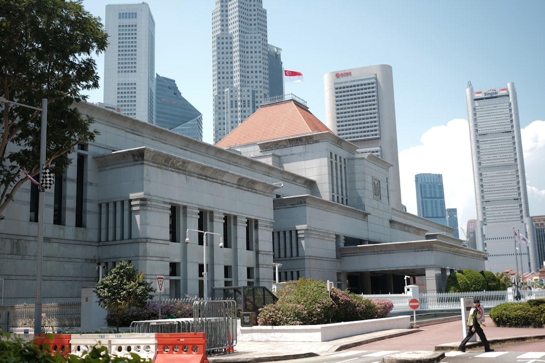 Historic building in front of modern skyscrapers