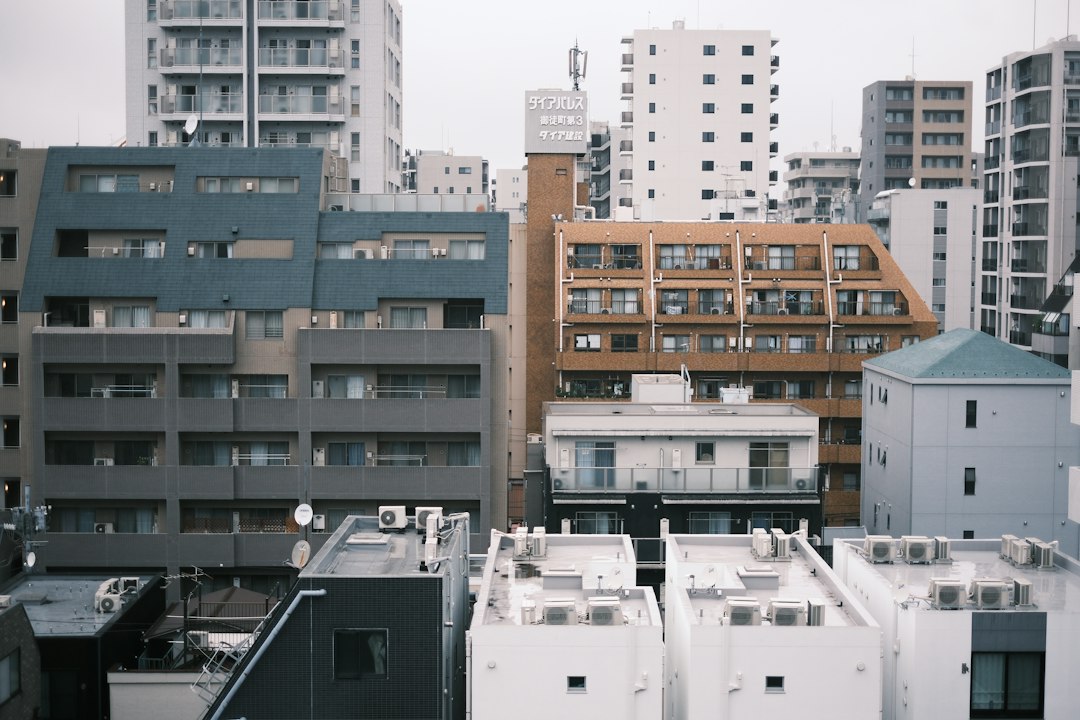 A dense urban cityscape with various buildings