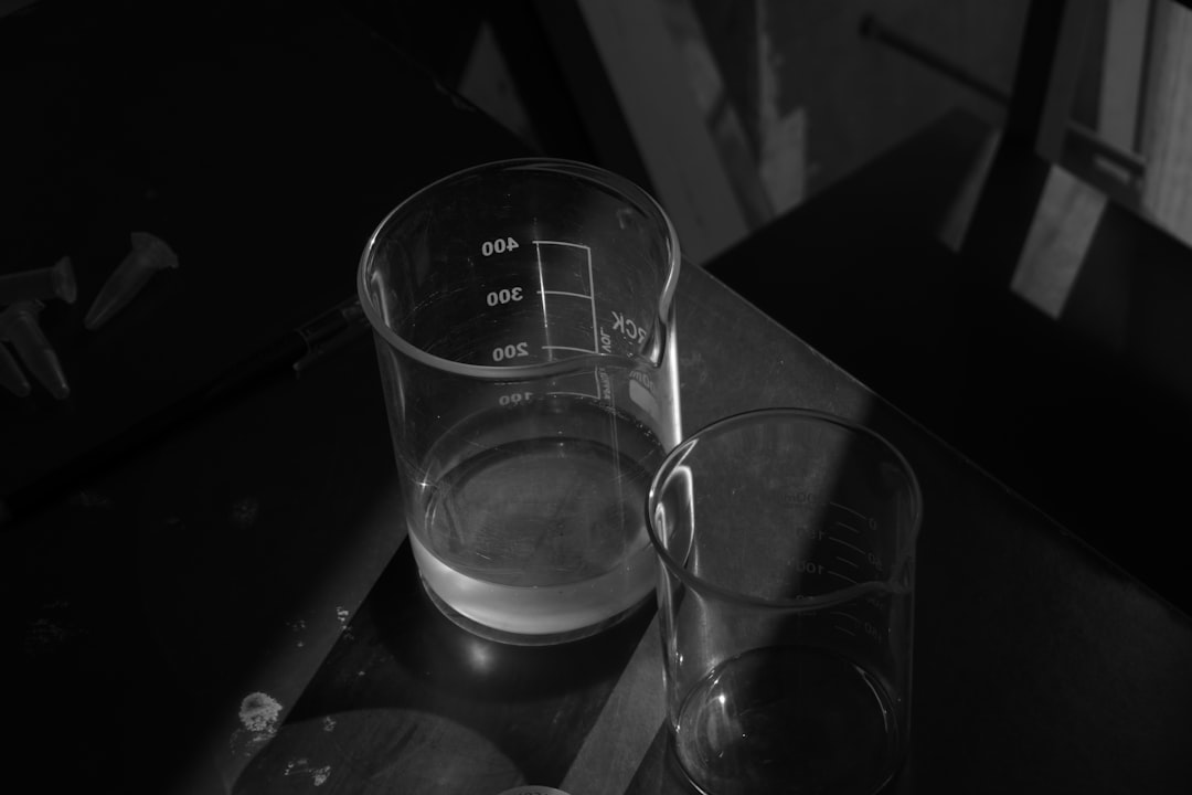 A black and white photo of a glass of water