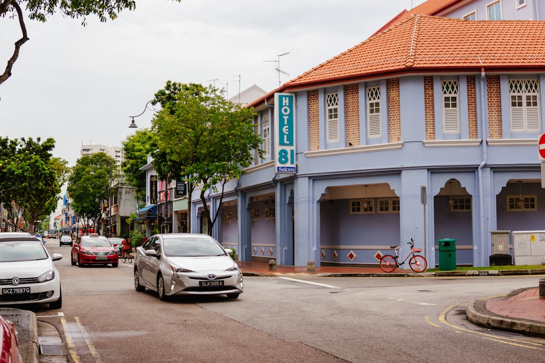 A street with cars parked on the side of it