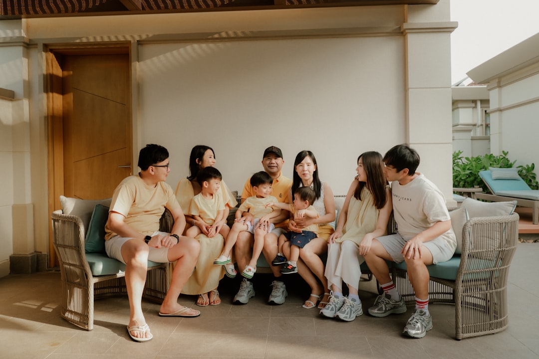 A large family gathered together on a patio