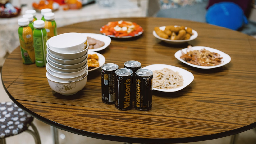 A table laden with food and drinks.