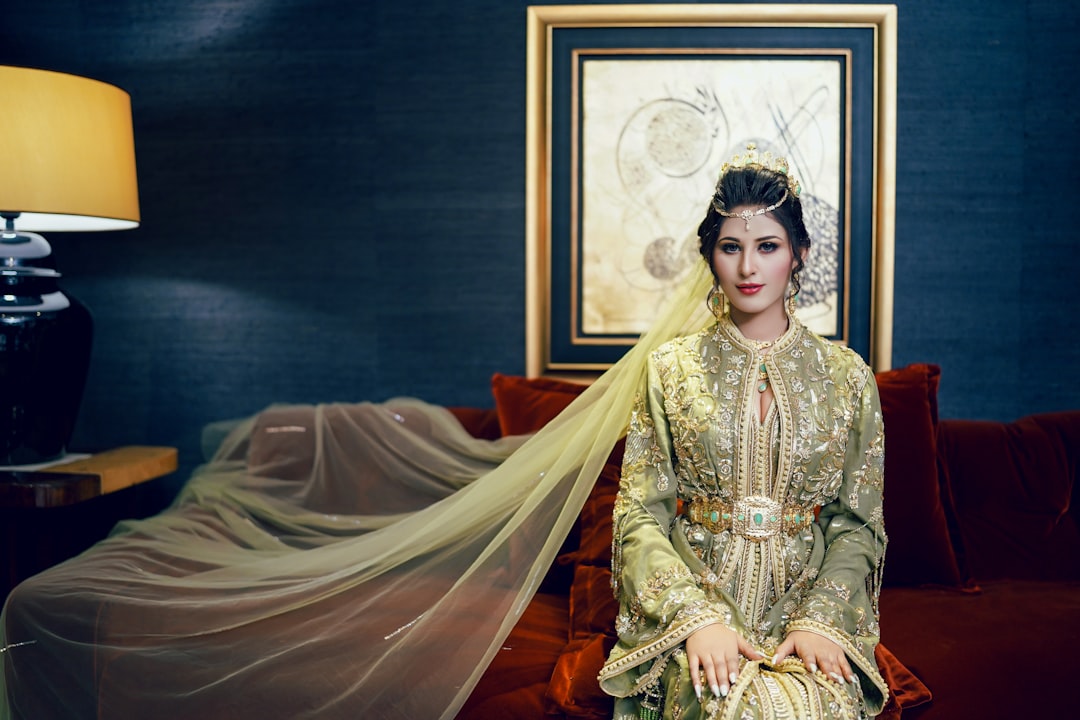 A woman sitting on a couch in a room