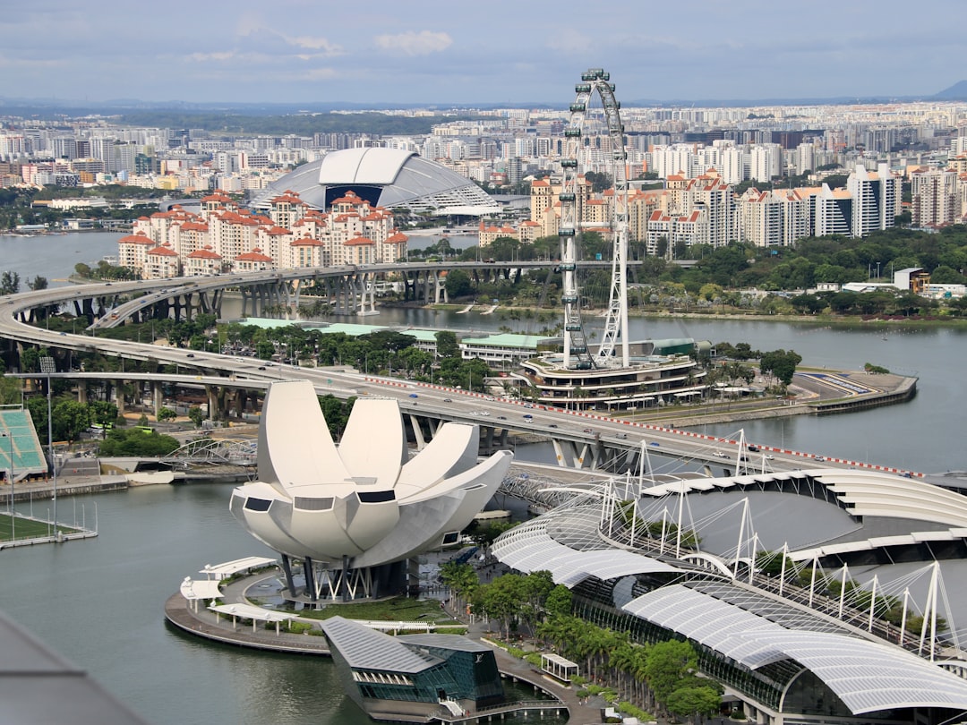 an aerial view of a city and a bridge