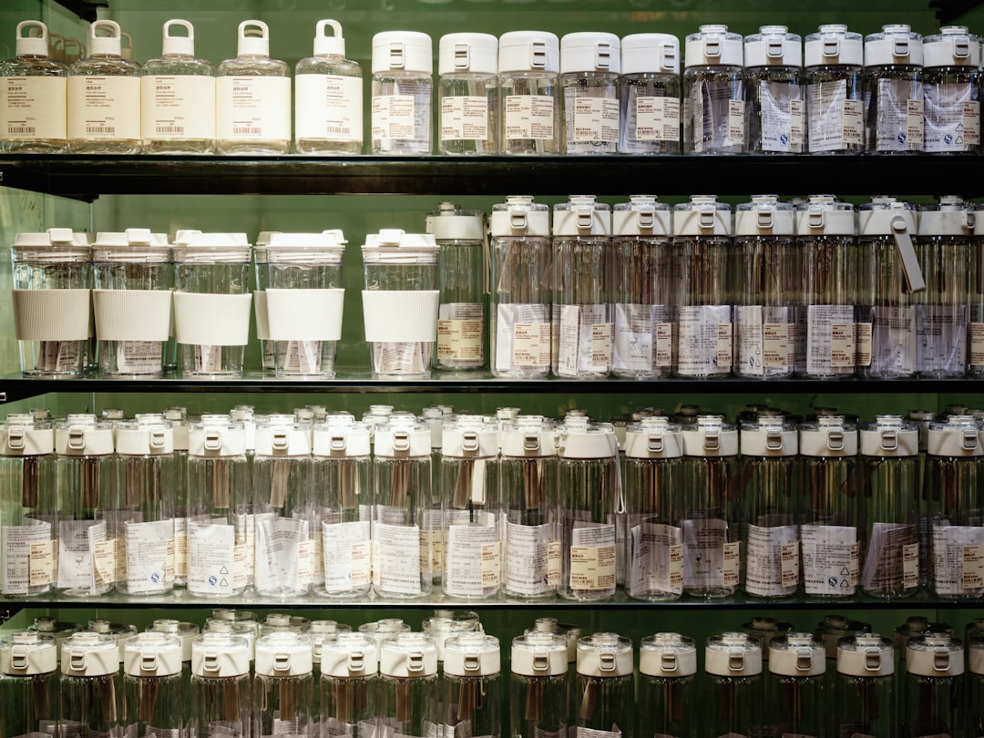 Shelves filled with clear bottles and containers.