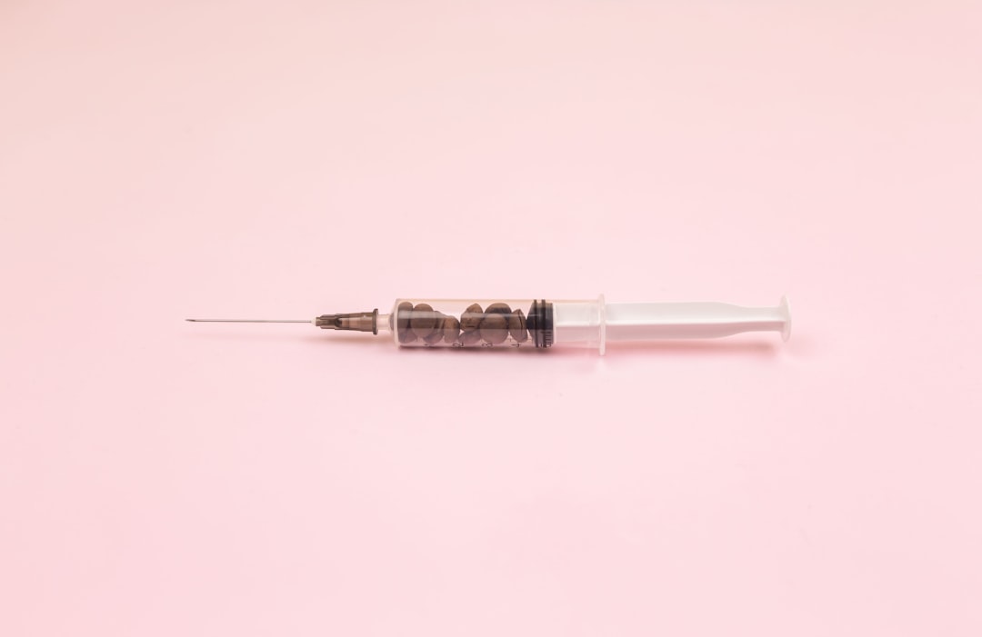 white and black pen on pink surface