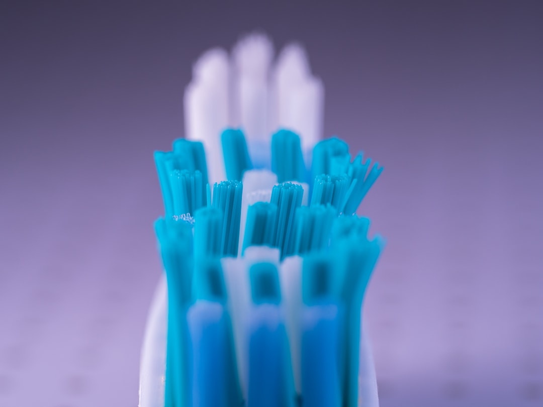Close-up view of a toothbrush head and bristles.
